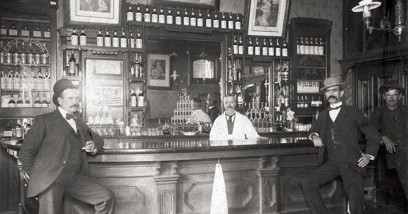 A Composed Bartender Poses with Patrons at a Fancy Saloon in Chico, Calif., Circa 1890