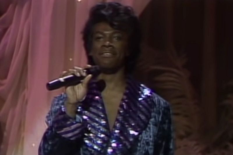 Eddie Murphy as James Brown