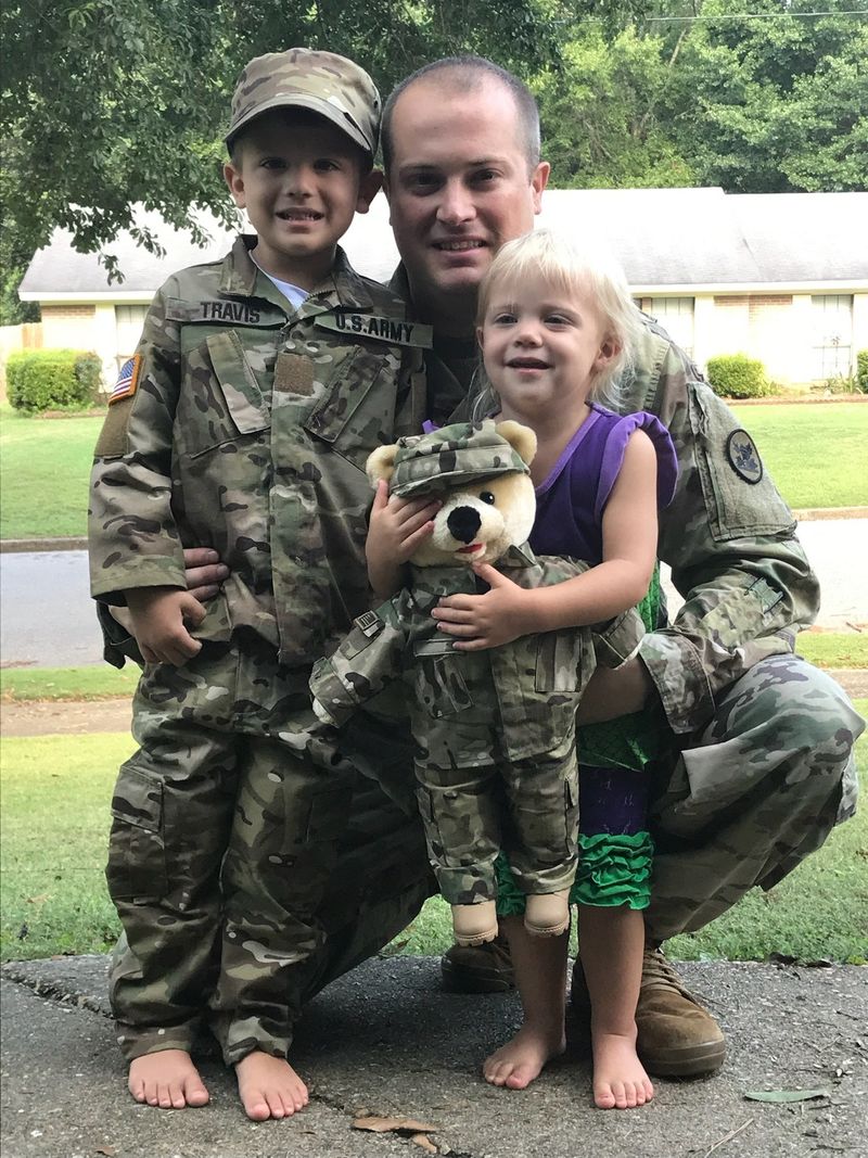 Military Parents in Uniform with Their Kids