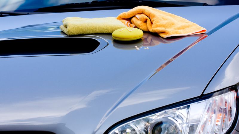 Polishing the Family Car in the Driveway