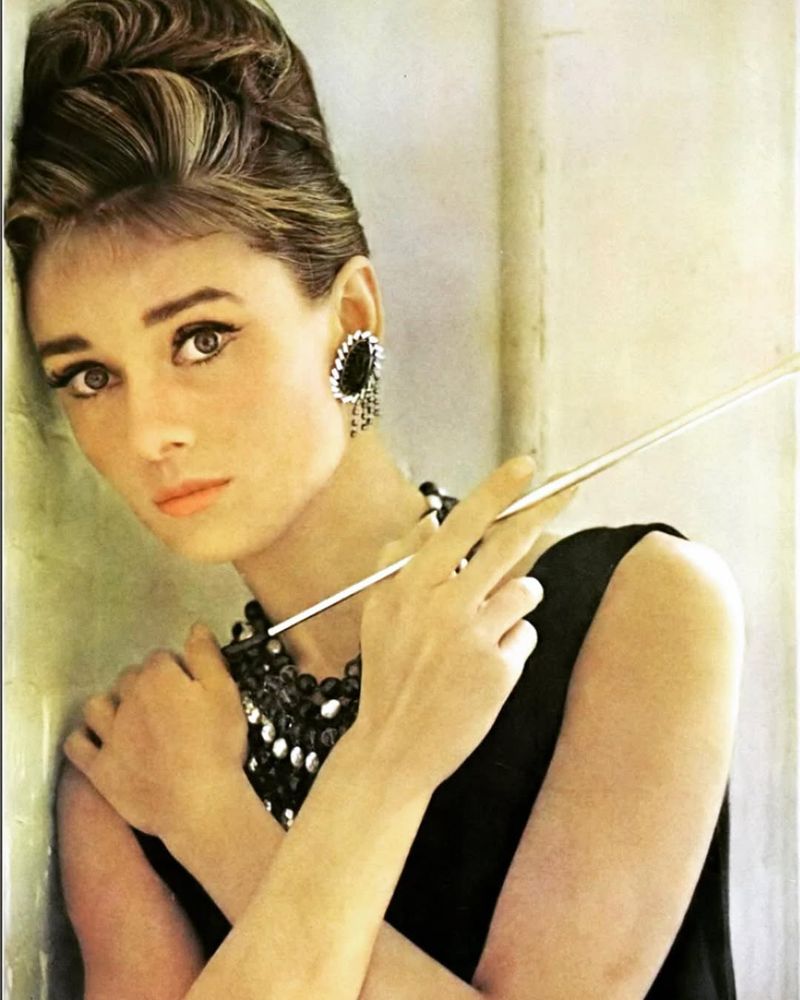 Audrey Hepburn as Holly Golightly