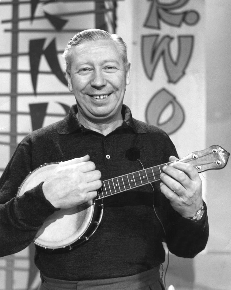 George Formby, English singer and comedian, 1961