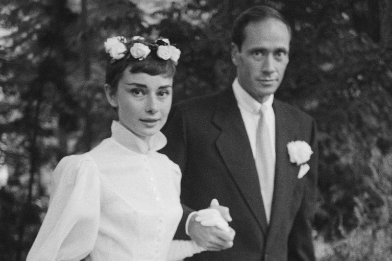 Audrey Hepburn & Mel Ferrer – The elegant 1954 ceremony united two timeless icons of style and grace.