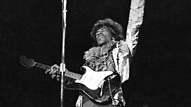 Who wrote and originally recorded All Along the Watchtower before Jimi Hendrix made it famous?