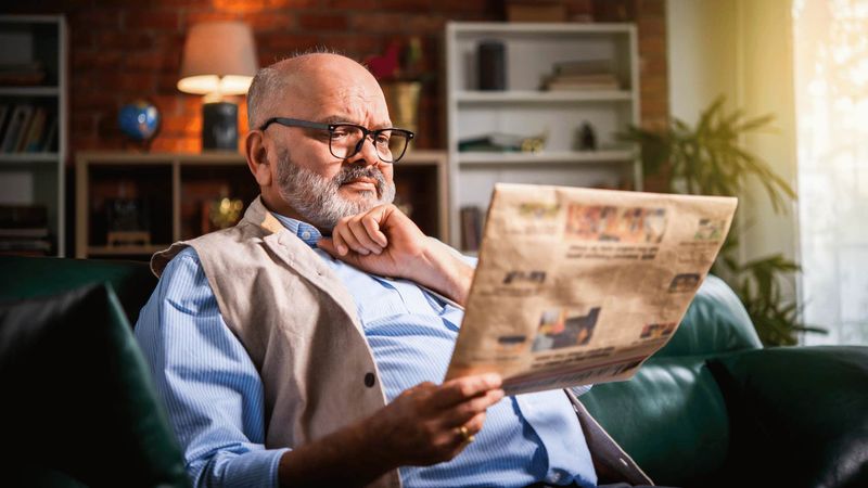 Reading the Newspaper Every Morning