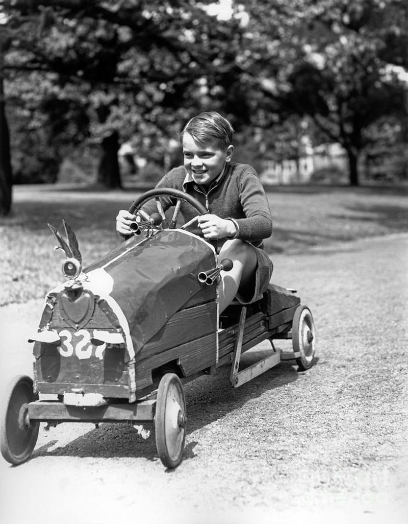 Boy and his toy car (1930s)