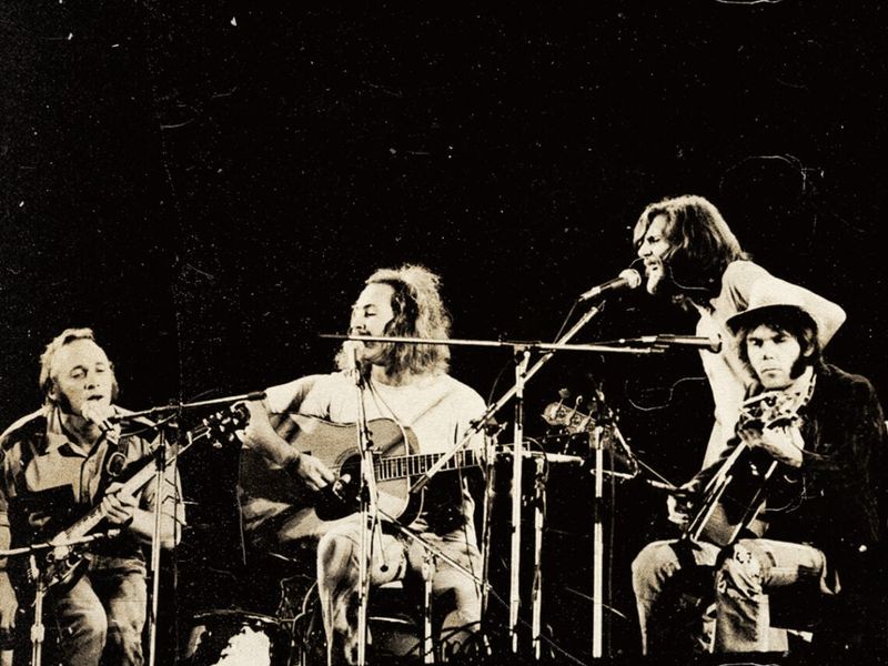 Crosby, Stills & Nash Harmonizing – The folk-rock trio performing under the sun