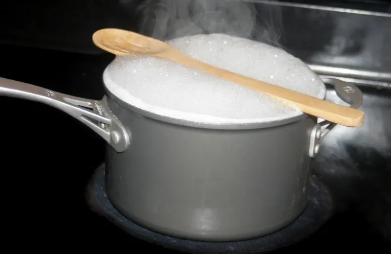 Use a Wooden Spoon to Prevent Boil-Overs