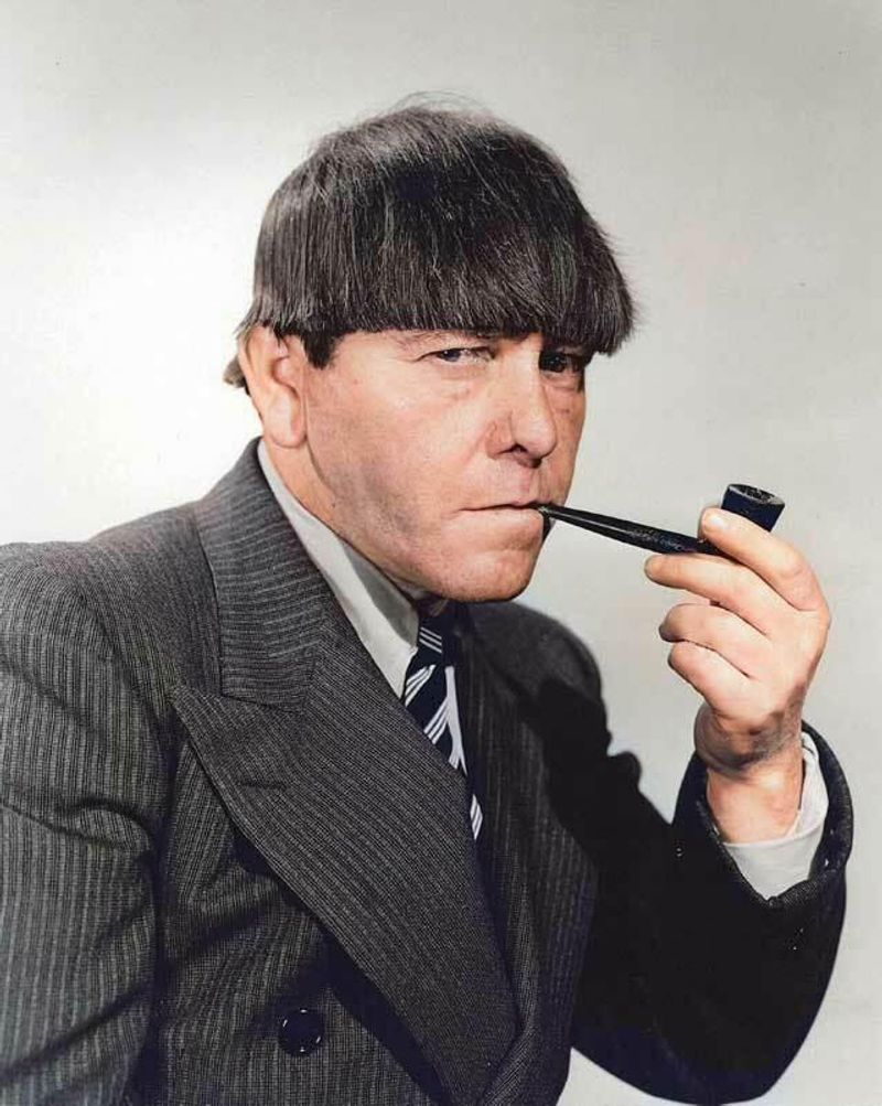 Moe Howard, American comedian (The Three Stooges), 1975