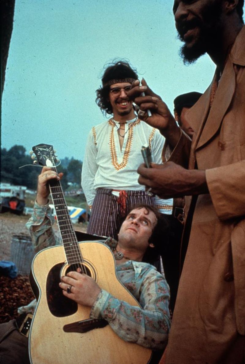 Guitars Around a Campfire – Musicians jamming together between sets