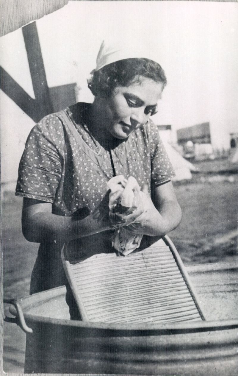 Hand-Washing Clothes on a Washboard