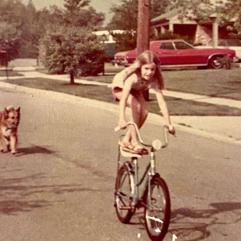 Riding a Bike With No Helmet