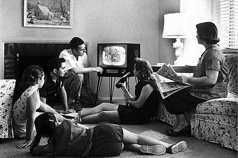 1. Families Gathered Around a New “Hearth” — The TV Set
