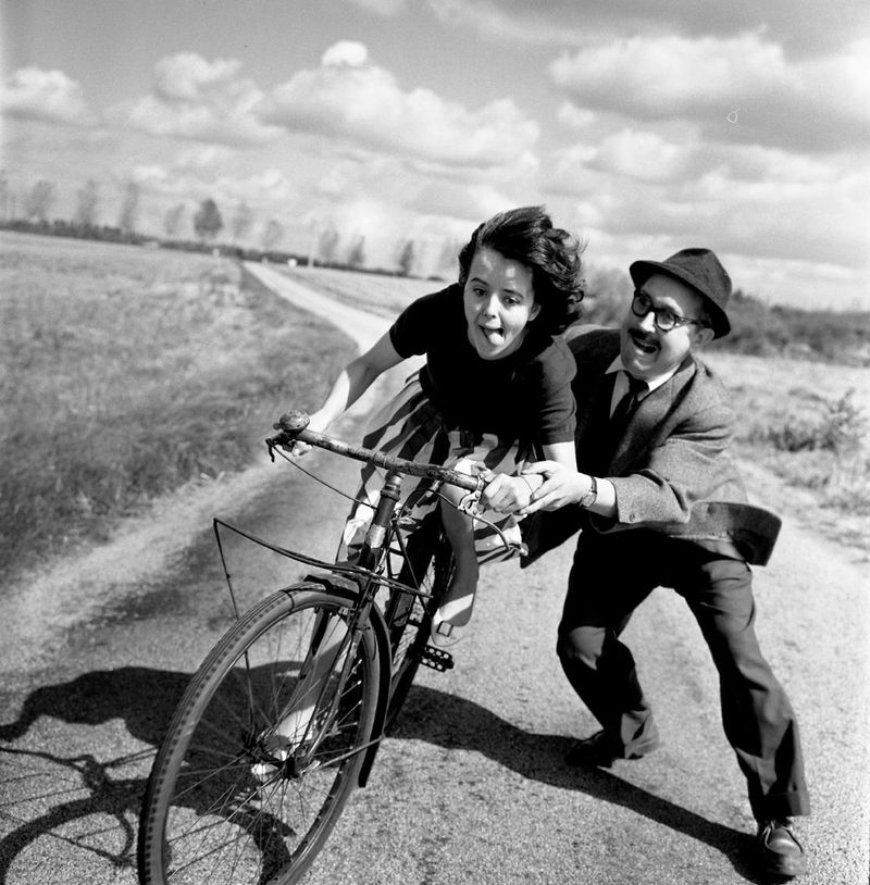 Child learning to ride a bicycle (1961)