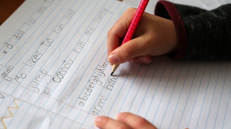 Copying School Notes by Hand from the Chalkboard