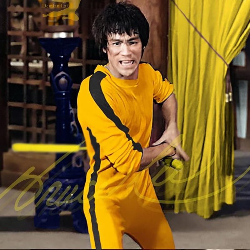 Bruce Lee – Poised in his yellow jumpsuit from Game of Death.