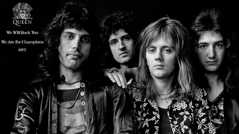 “We Will Rock You” / “We Are the Champions” – Queen (1977)
