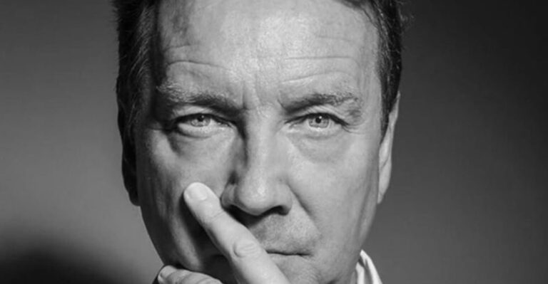 In Memoriam: 15 Things to Know About John Reid, the Voice Behind “Push the Feeling On”