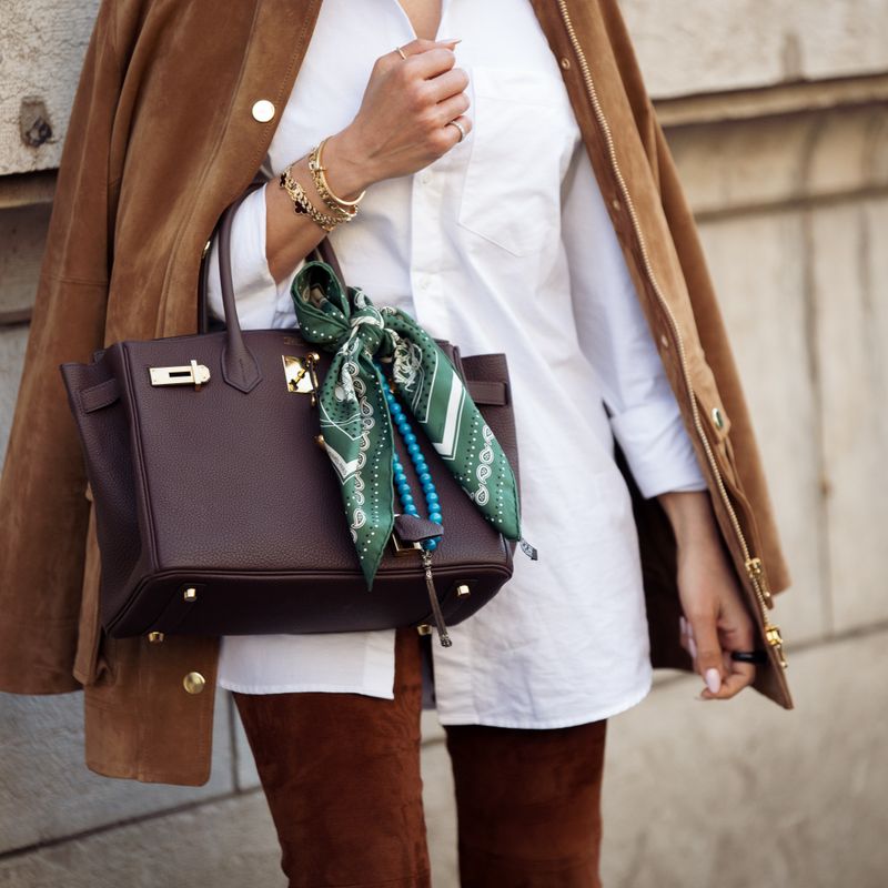 Hauling Around Gigantic Purses Full Of 