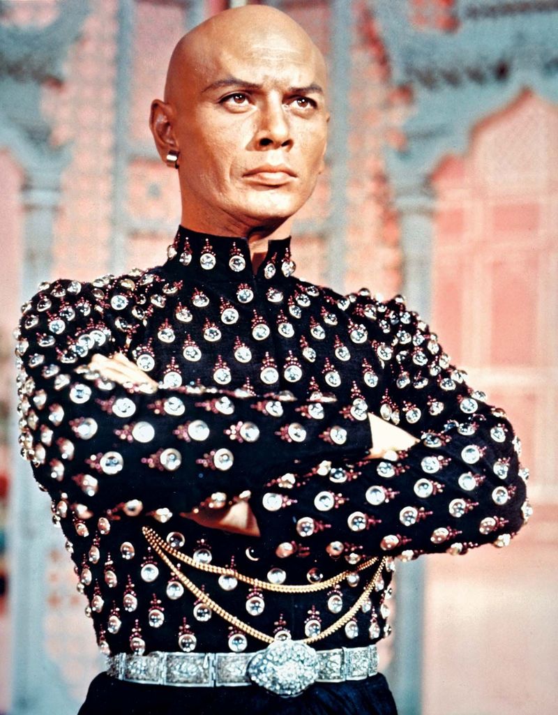Yul Brynner – Bald, bold, and exuding exotic magnetism in The King and I.