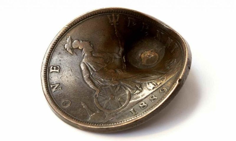 Coins With Bullet Dents