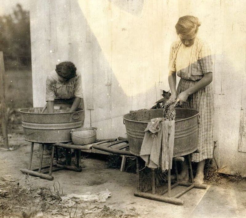 Hand-Washing Clothes or Using a Wringer Washer