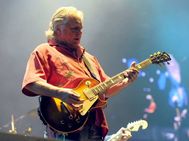 Developing His Distinctive Blues-Rock Guitar Style