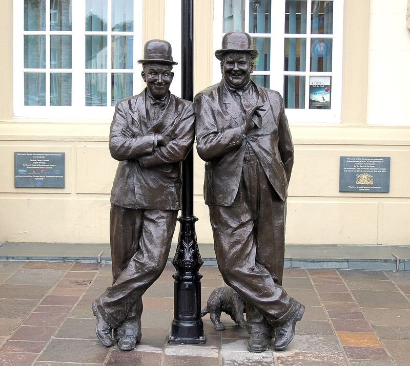 Their Statues Stand Where Their Smiles Began