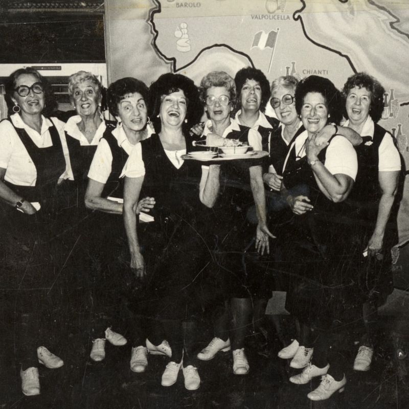 Waitress Smiles and Paper Hats
