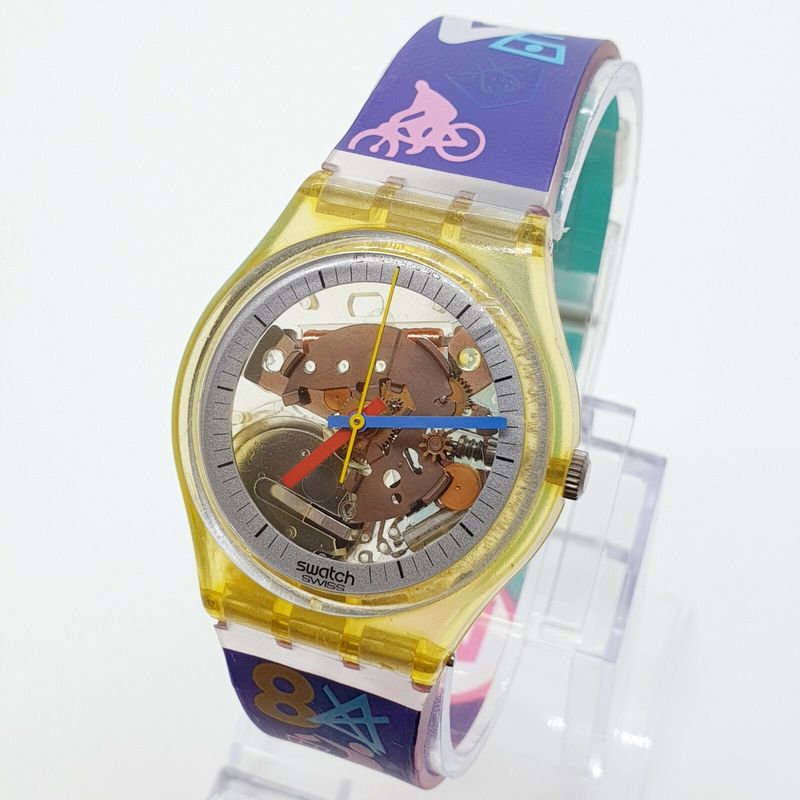 Wearing Jelly Shoes and Swatch Watches