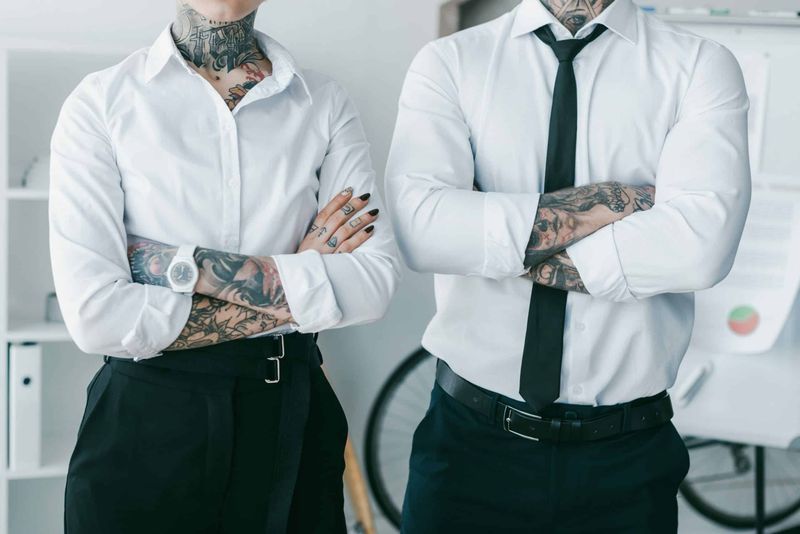 No Visible Tattoos or Piercings